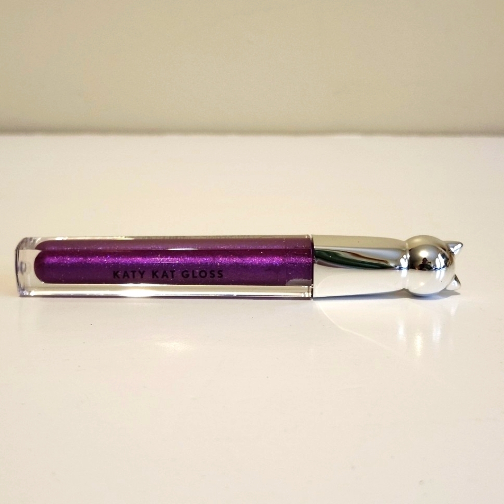 *4 for $20* Katy Kat Gloss in Purple Paws - Shimmer